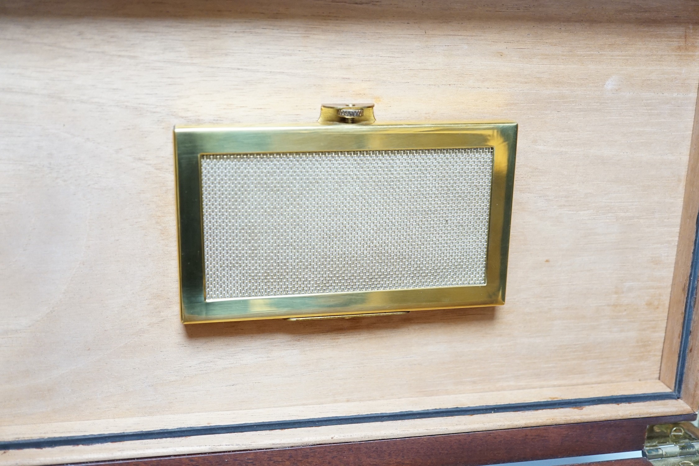 A mahogany humidor with silver cartouche inset, 33cms wide x 17cms high